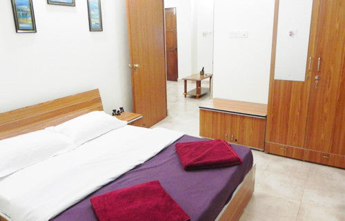 Stay at Holiday Apartments Baga (Goa): Fully Furnished 1BHK/2BHK AC Holiday Apartments, Swimming pool, Modern kitchen with all necessary cooking appliances & More!