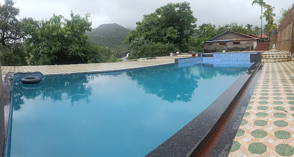 Amba Ghat (Kolhapur)- Lake view stay with boating, swimming pool, All Meals & More!